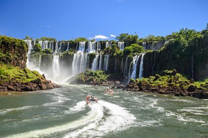 A boat in a river with Iguazu Falls

Description automatically generated