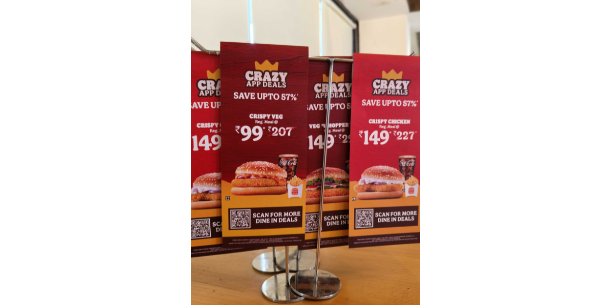 Burger King QR Code displayed on table tents inside the dine-in restaurant.