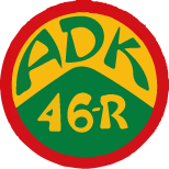 A red and yellow circle with green text

Description automatically generated