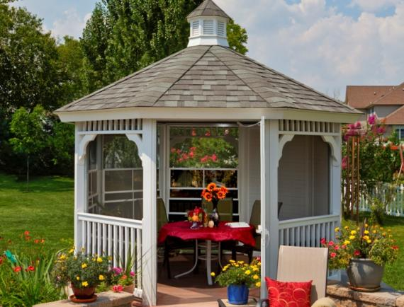 octagon gazebo with red dining set inside