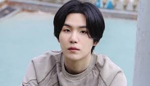A picture of BTS members Suga