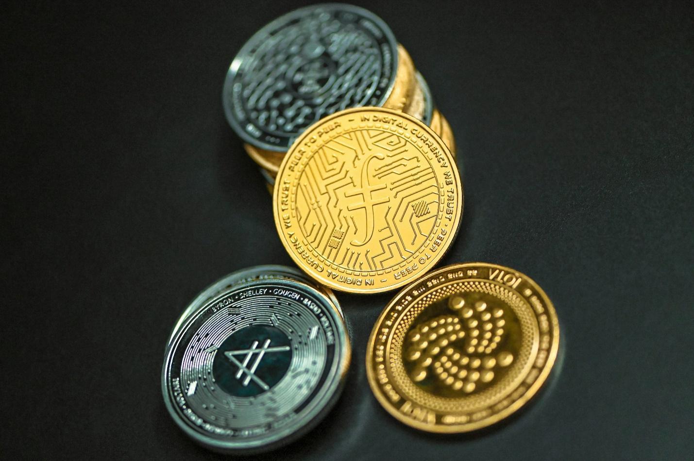 a group of coins sitting on top of a table