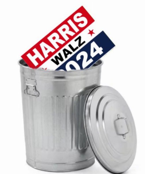 A trash can with a sign inside

Description automatically generated