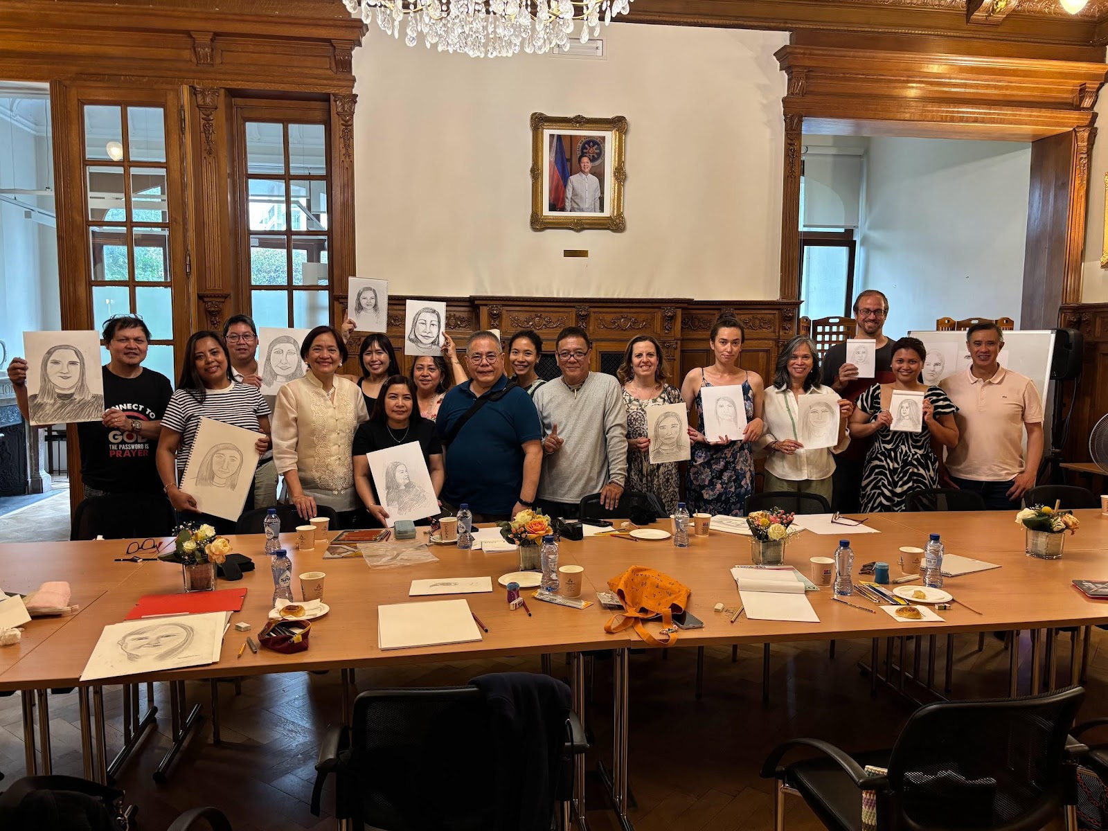A group of people holding up portraitsAI-generated content may be incorrect.