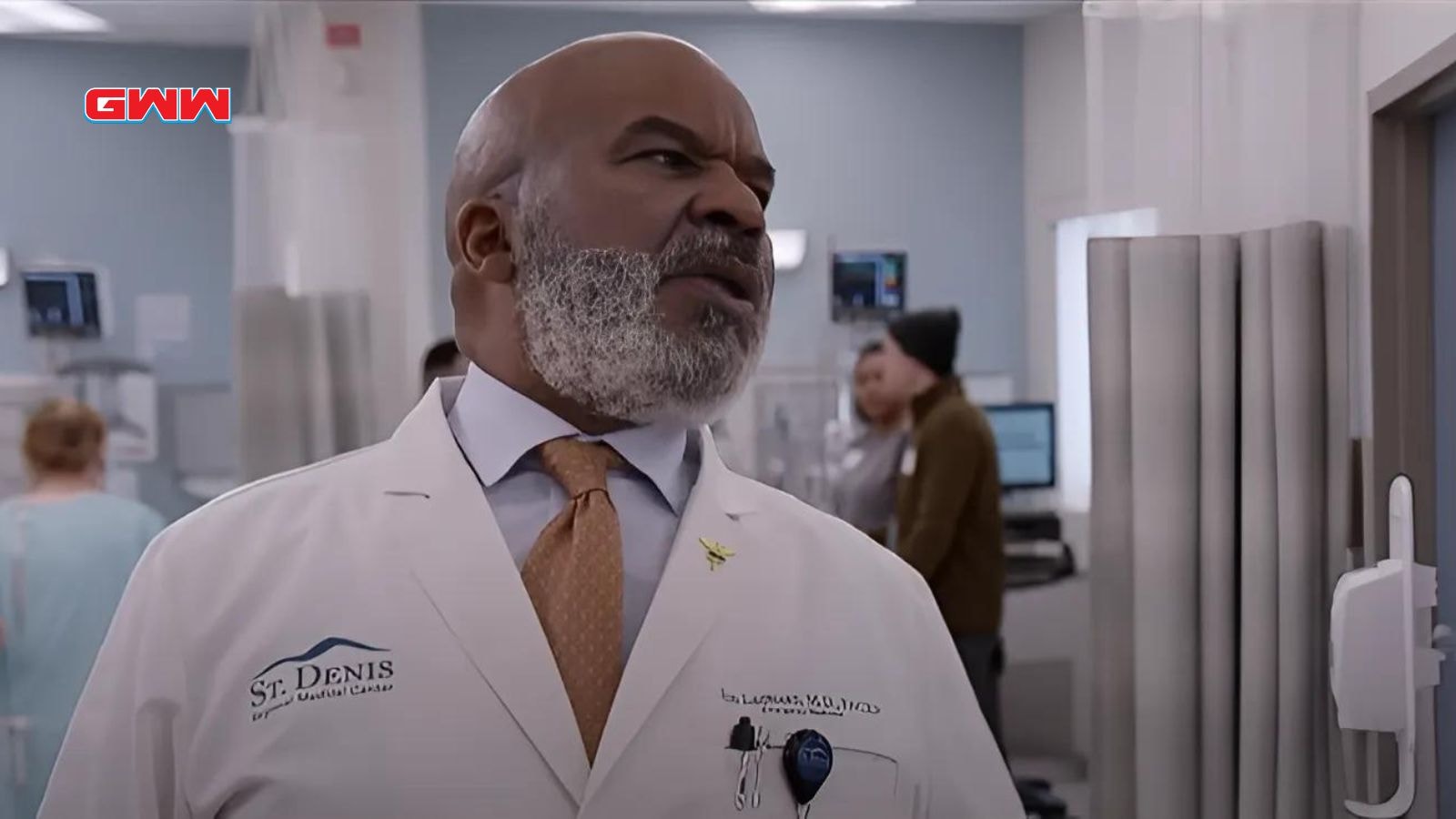 David Alan Grier looks stern in hospital corridor