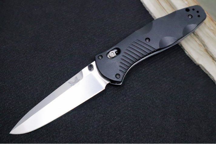 An image showcasing the Benchmade Barrage 580, an assisted opener with a satin 154CM stainless steel blade and an ergonomically contoured handle. With a blade length of 3.6 inches, this knife is ideal for everyday carry.