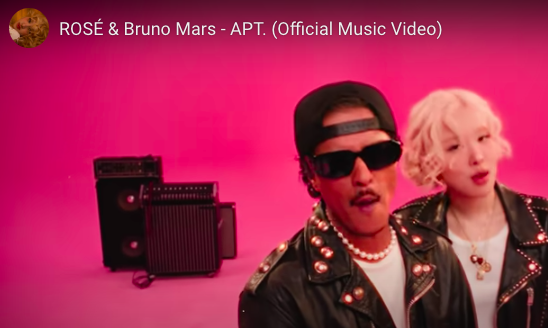 This contain an image of ROSE & BRUNO MARS- APT. official music video