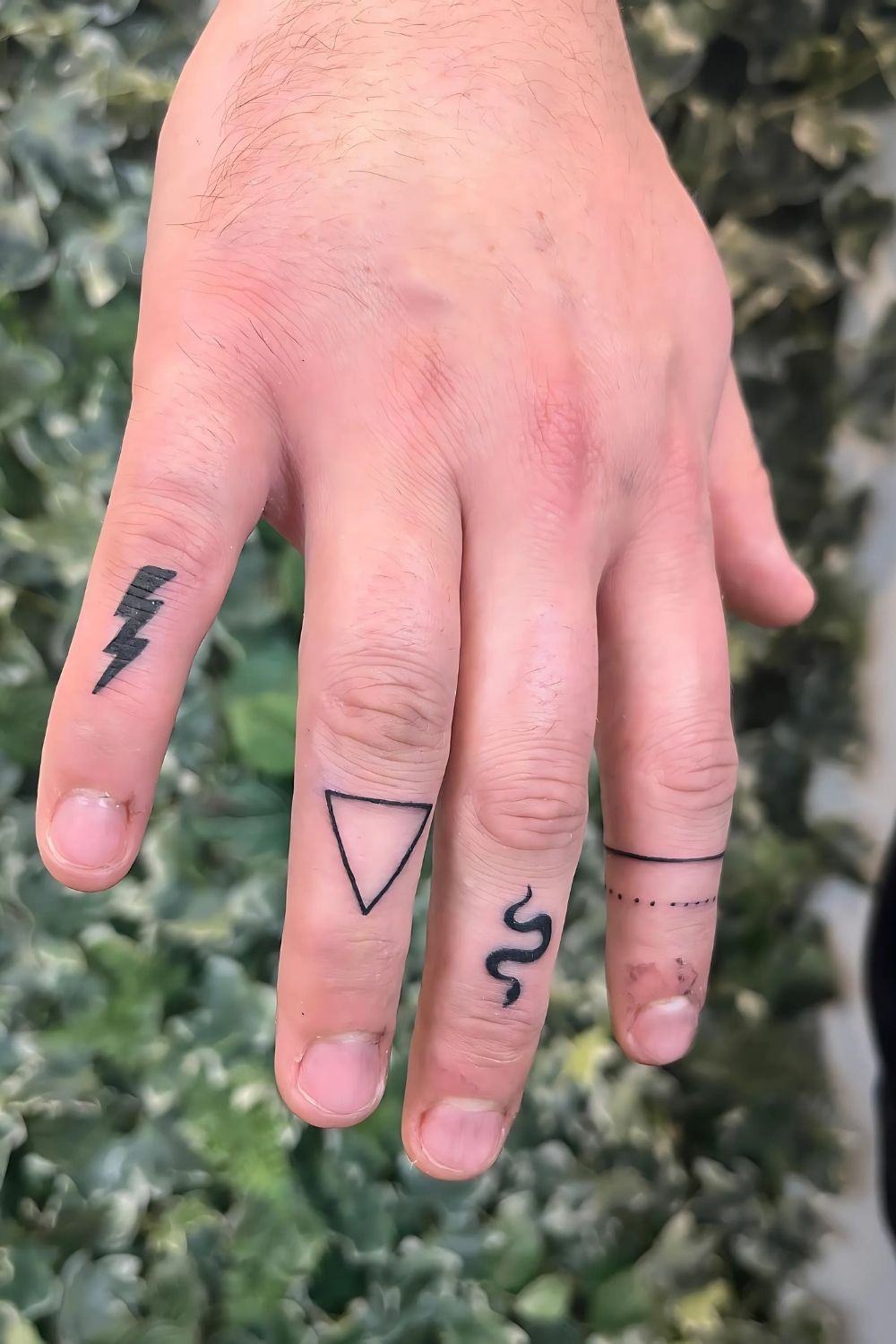 Tiny Finger Tattoo