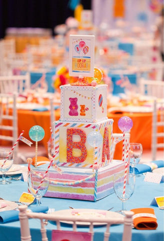 Brightly colored centerpiece for a candy-themed summer baby shower