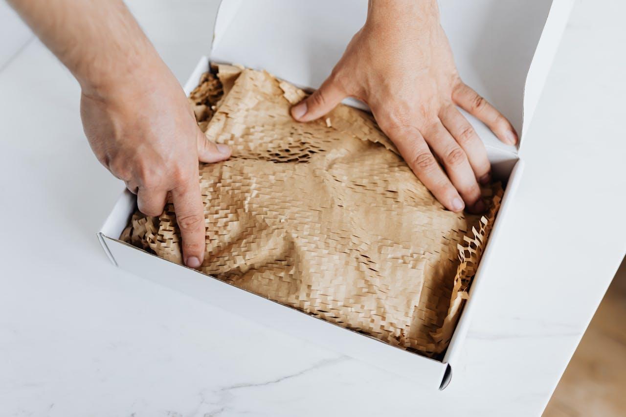 A man preparing a package for shipment