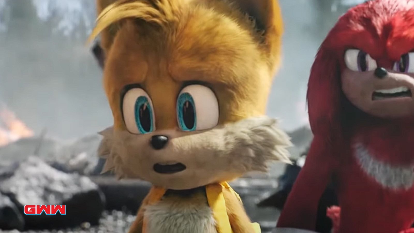 Tails and Knuckles look shocked in a dramatic moment from Sonic movie.