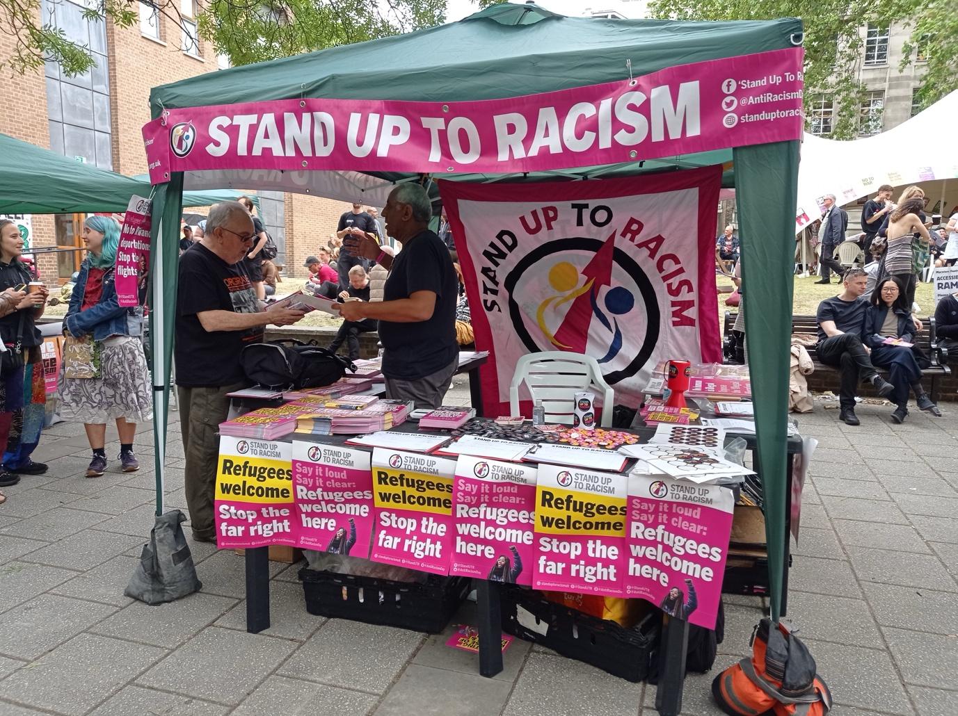 A stand up to racism booth

Description automatically generated