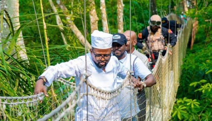 Visitors enjoying the canopy walkway and lush rainforest views at Lekki Conservation Centre, Lagos.