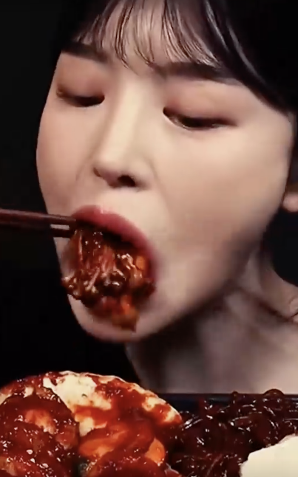 A picture of Mukbang YouTuber eating food
