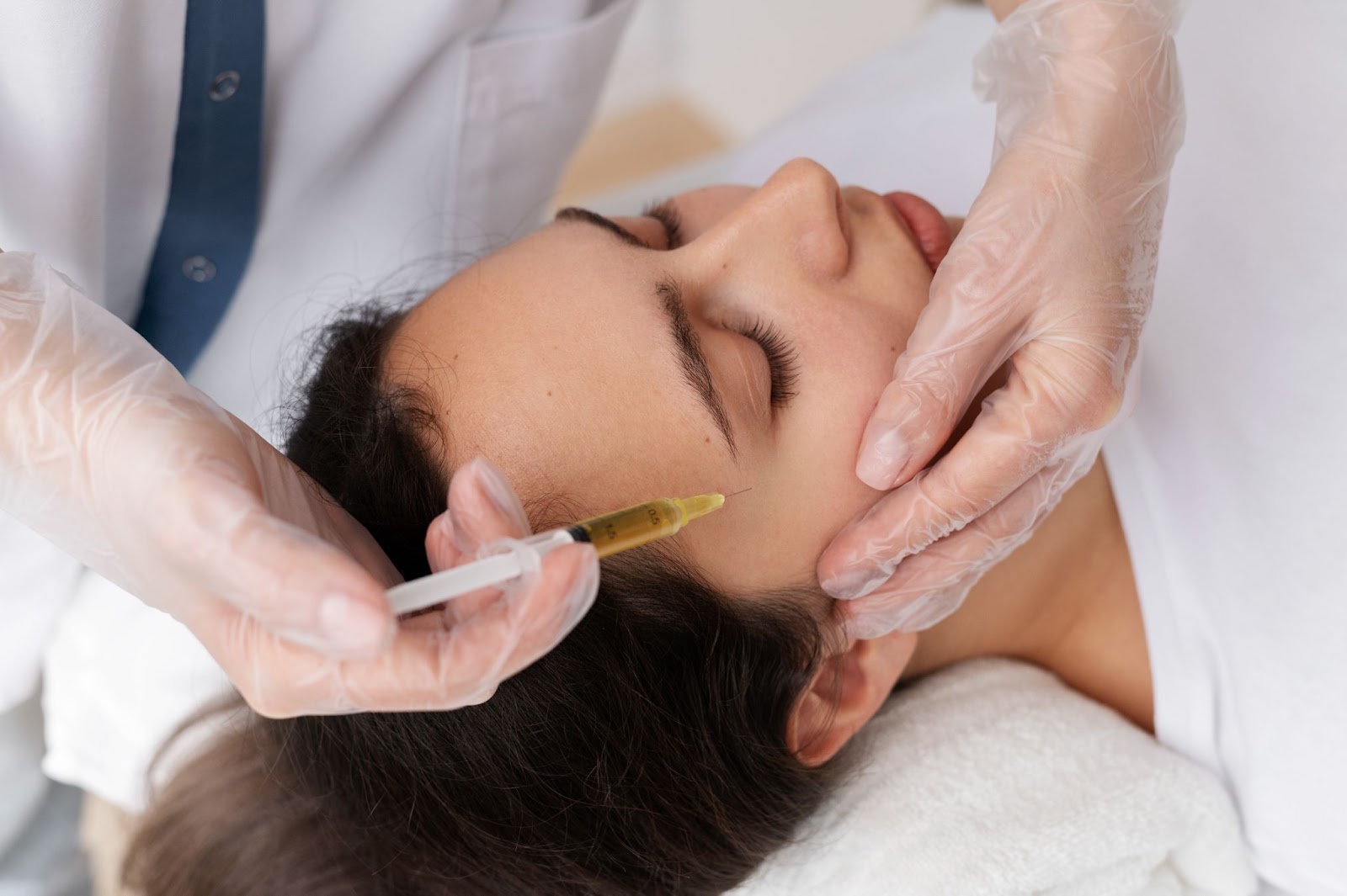 women getting botox on eye 