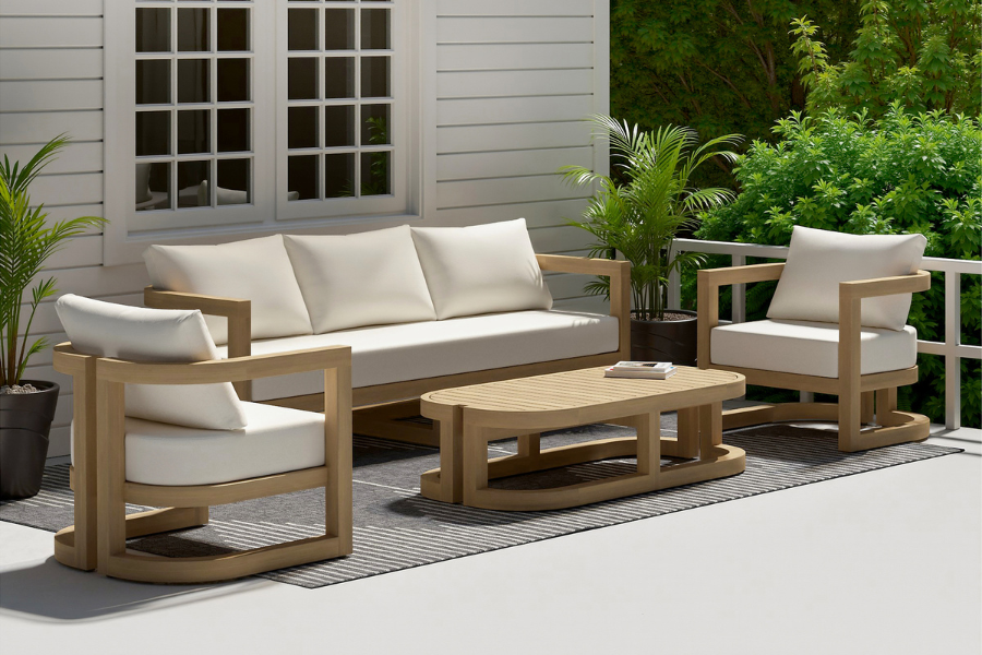 Sarpa 4 Piece Acacia Wood Outdoor Patio Seating Set including two club chairs, a three-seat sofa, and a slatted-top coffee table—blending bold architecture with plush comfort in a cohesive, modern patio arrangement.