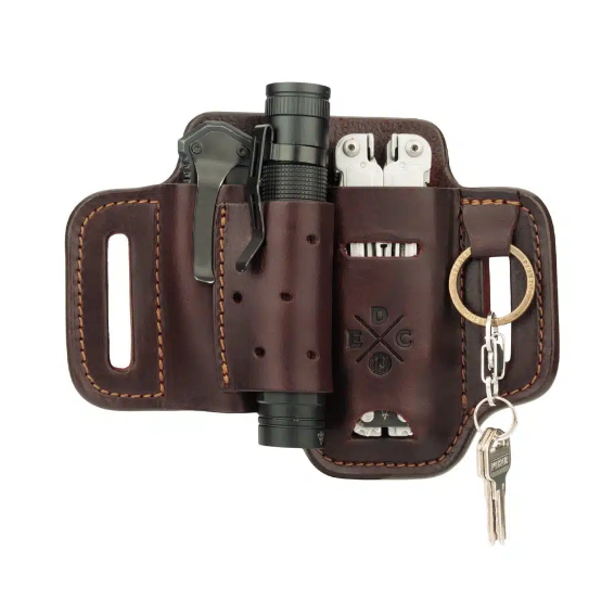 A leather tool case with a flashlight and key chain

Description automatically generated