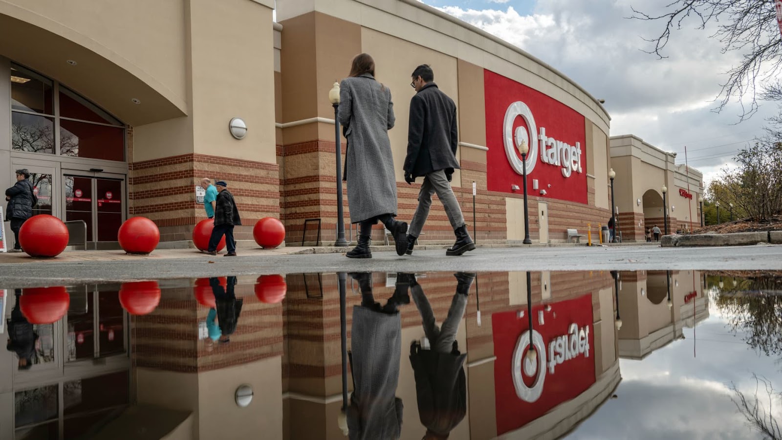 Shoppers outside a Target store ahead of Black Friday in Clifton, New Jersey, US, on Tuesday, Nov. 26, 2024. Economists will be paying close attention to Black Friday and Cyber Monday sales to get a sense of consumers appetite for holiday shopping. Photographer: Victor J. Blue/Bloomberg via Getty Images