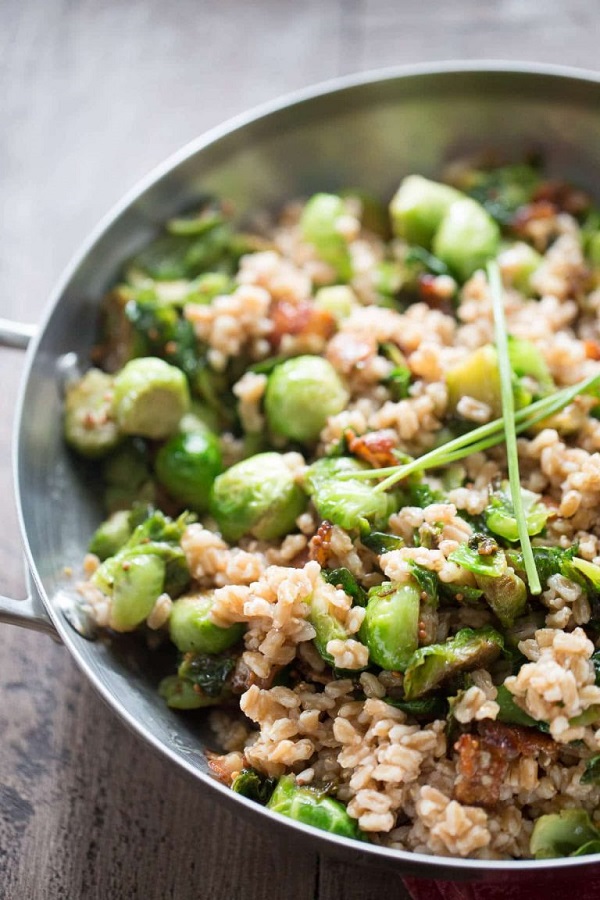 Brussels sprouts and farro salad in a metal serving dish