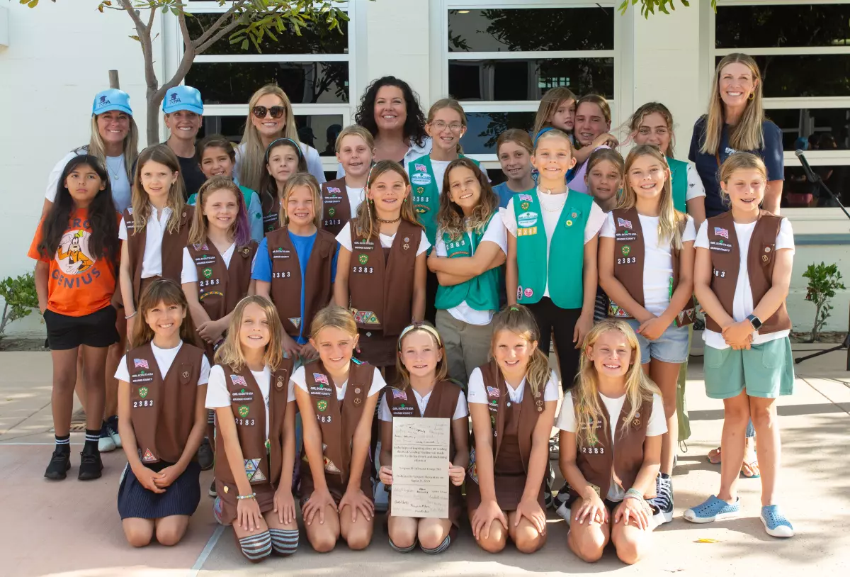 Girl Scout Troop Donates Book Vending Machine to Newport Elementary