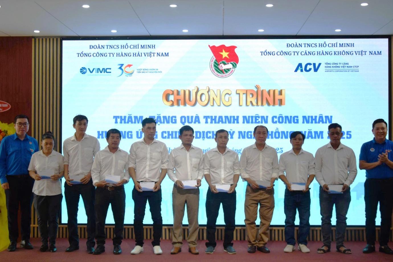 A group of men standing in front of a large screenAI-generated content may be incorrect.