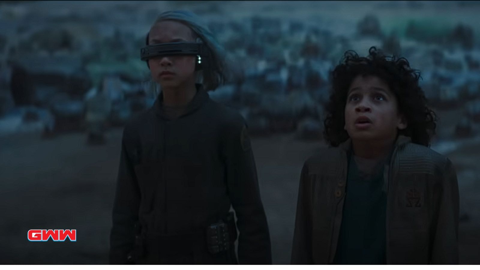 Kyriana Kratter and Ravi Cabot-Conyers staring at the sky in amazement in Skeleton Crew trailer.