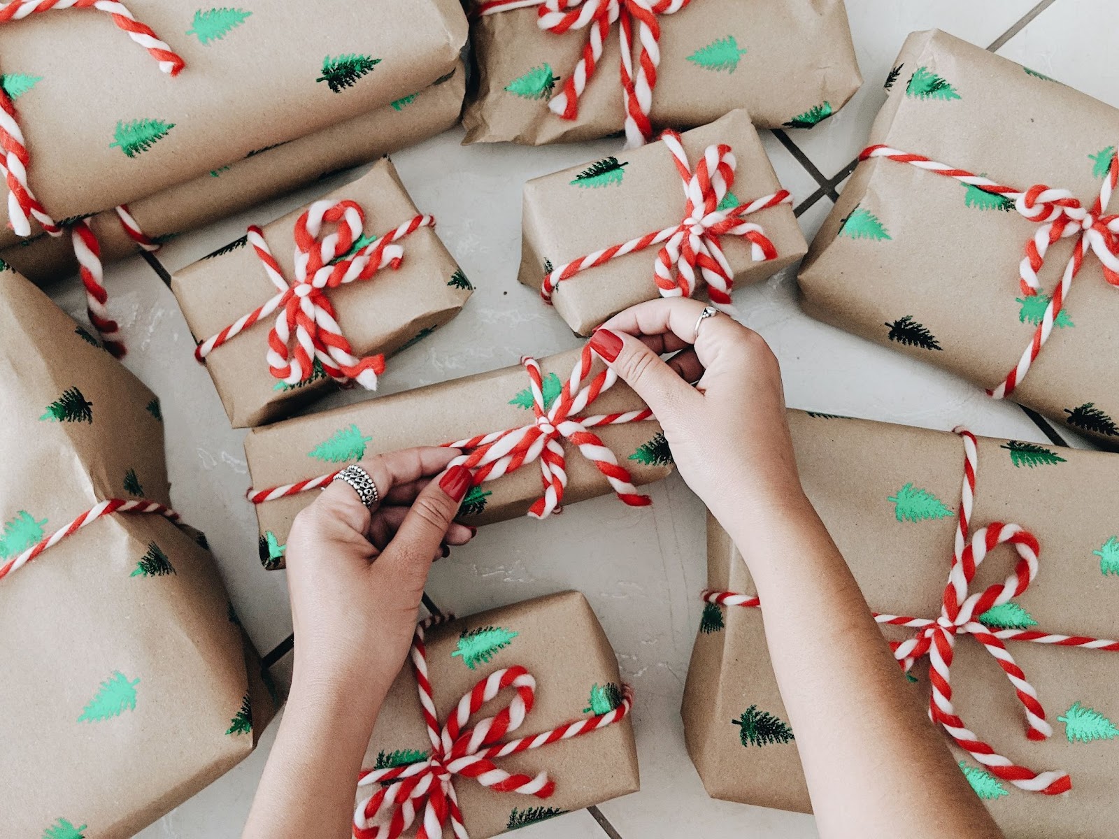 a pile of wrapped Christmas gifts