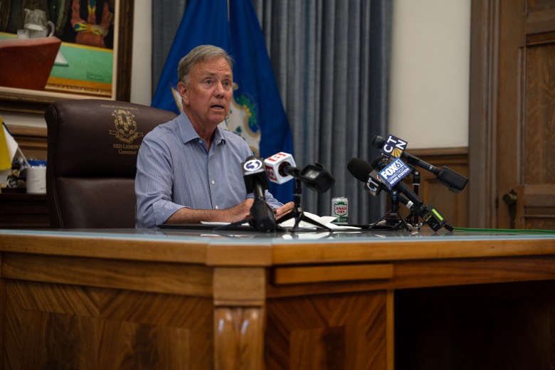 Governor Ned Lamont signing legislation