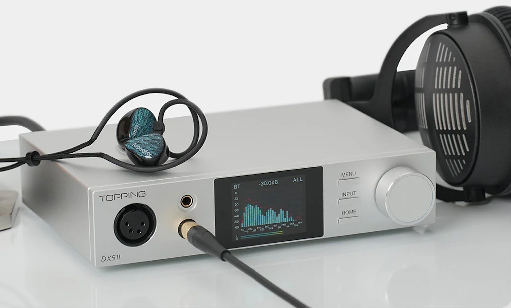 Topping DX5 II connected to headphones.