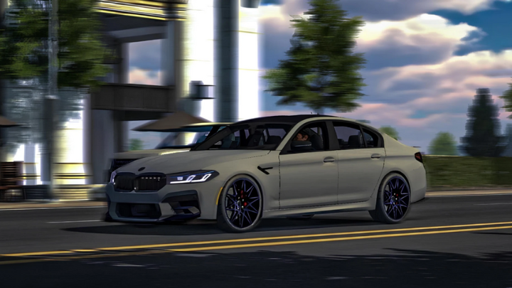 A gray BMW M5 driving in the Car Parking Multiplayer virtual city