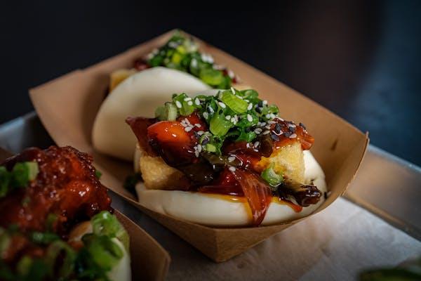 Food being served in a disposable paper container