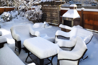signs your outdoor living space is ready for a remodel snowed in patio area custom built michigan
