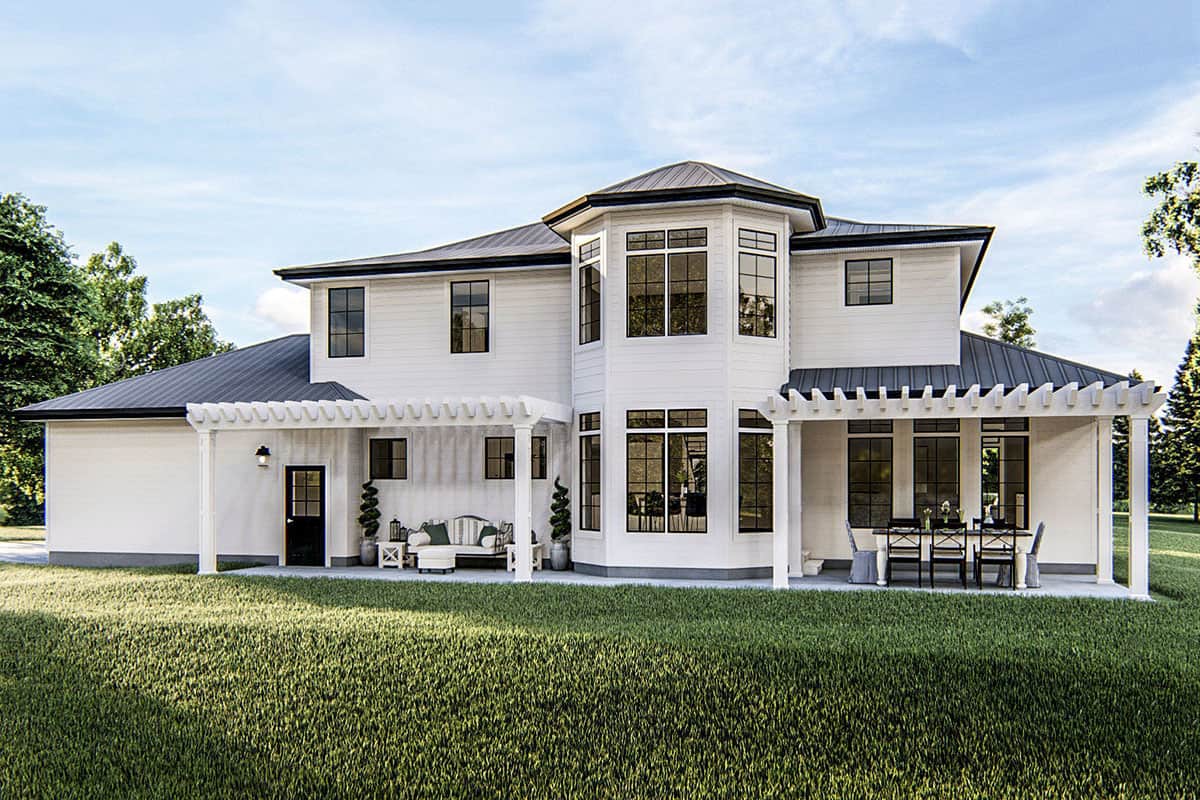 Rear rendering with a charming turret flanked by pergolas.