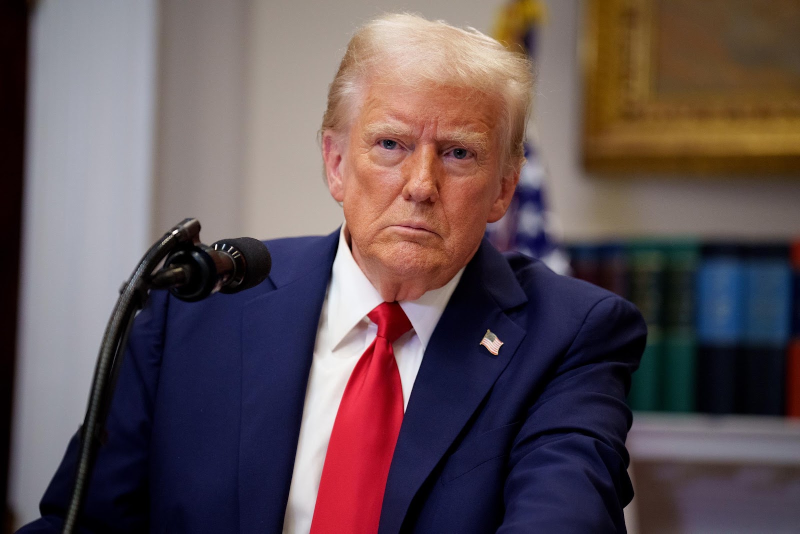 President Donald Trump taking a question from a reporter during a news conference in Washington, D.C., on January 21, 2025. | Source: Getty Images