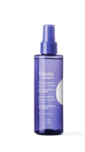 A purple bottle with a white label

Description automatically generated