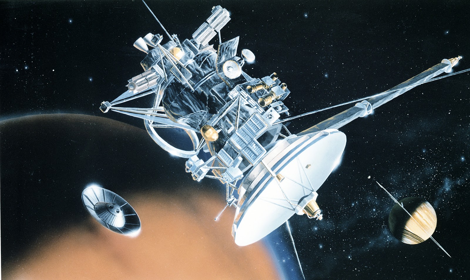 An illustration of a shiny silver spacecraft in space orbiting a reddish-brown moon. The planet Saturn can be seen to the right of the spacecraft and moon, and another small silver lander can be seen descending to the moon’s surface.