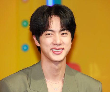 This contains an image of BTS Jin 