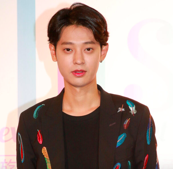 This contain an image of   Jung Joon Young in  black  clothing 
