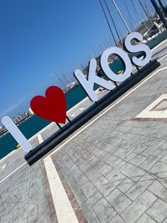 This contains an image of I ❤️ Kos 🇬🇷 logo 