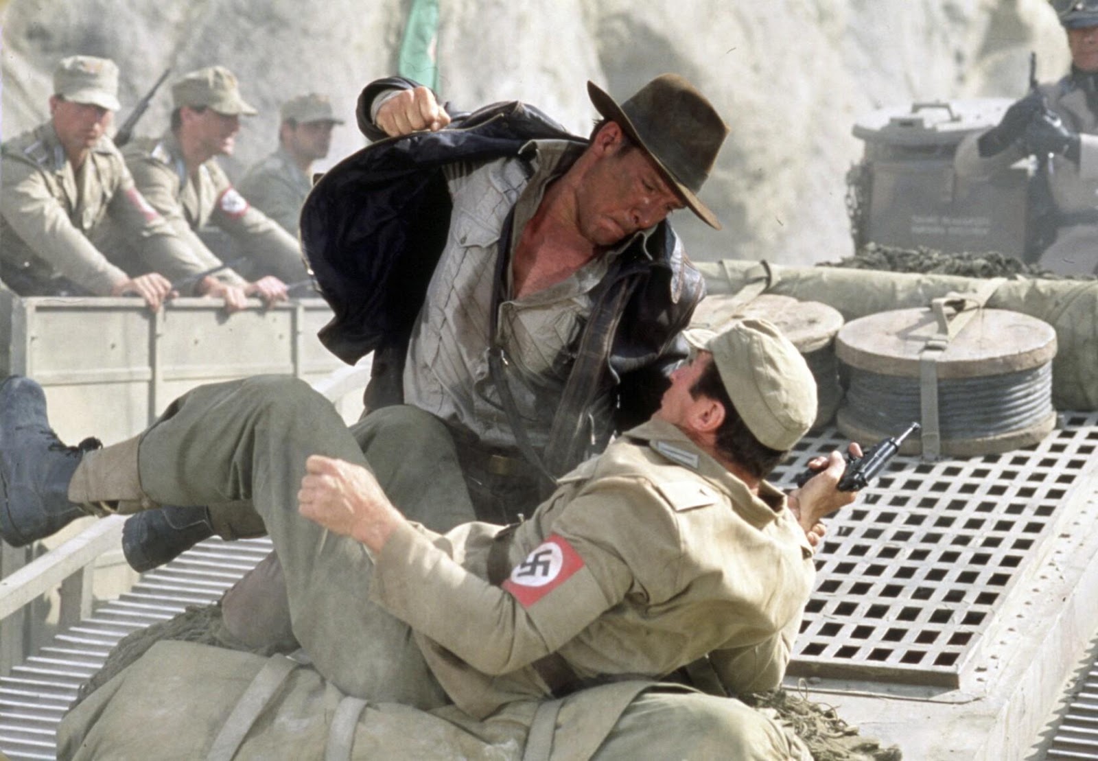 Indiana Jones rears back to deck a Nazi in the face on top of a moving tank.
