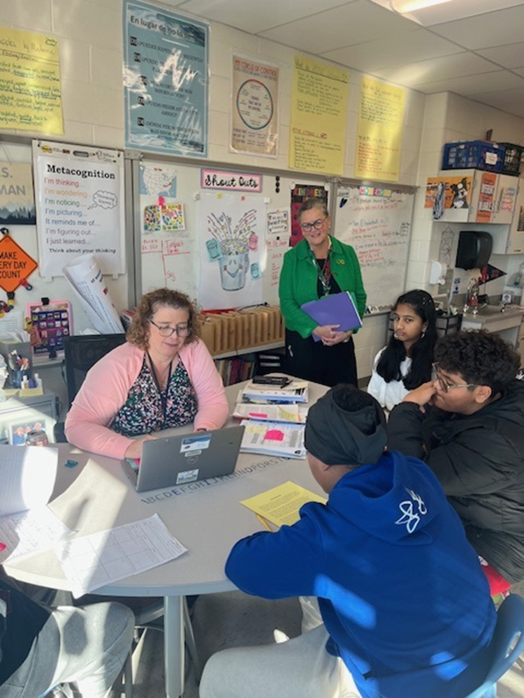 Dr. Reid observing a small group lesson at McNair Upper Elementary School. 