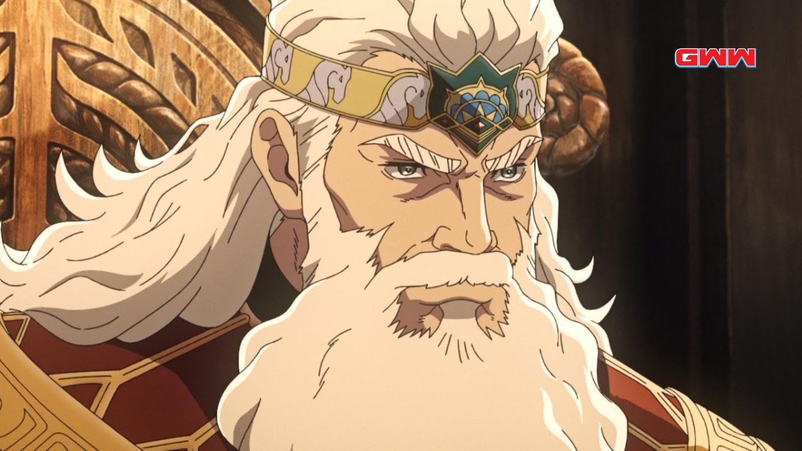 Elderly king with a long white beard wears an ornate golden crown.