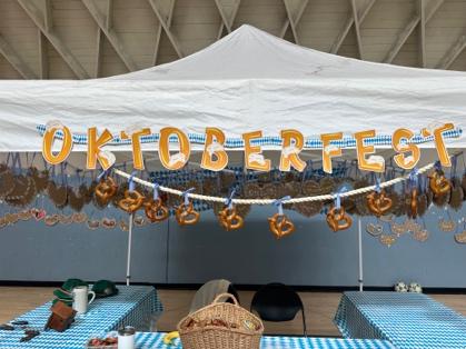 A white tent with blue and white checkered tables and a white tent with blue and white checkered tables and a white tent with a white ceiling and a white ceiling with a white ceiling and aAI-generated content may be incorrect.