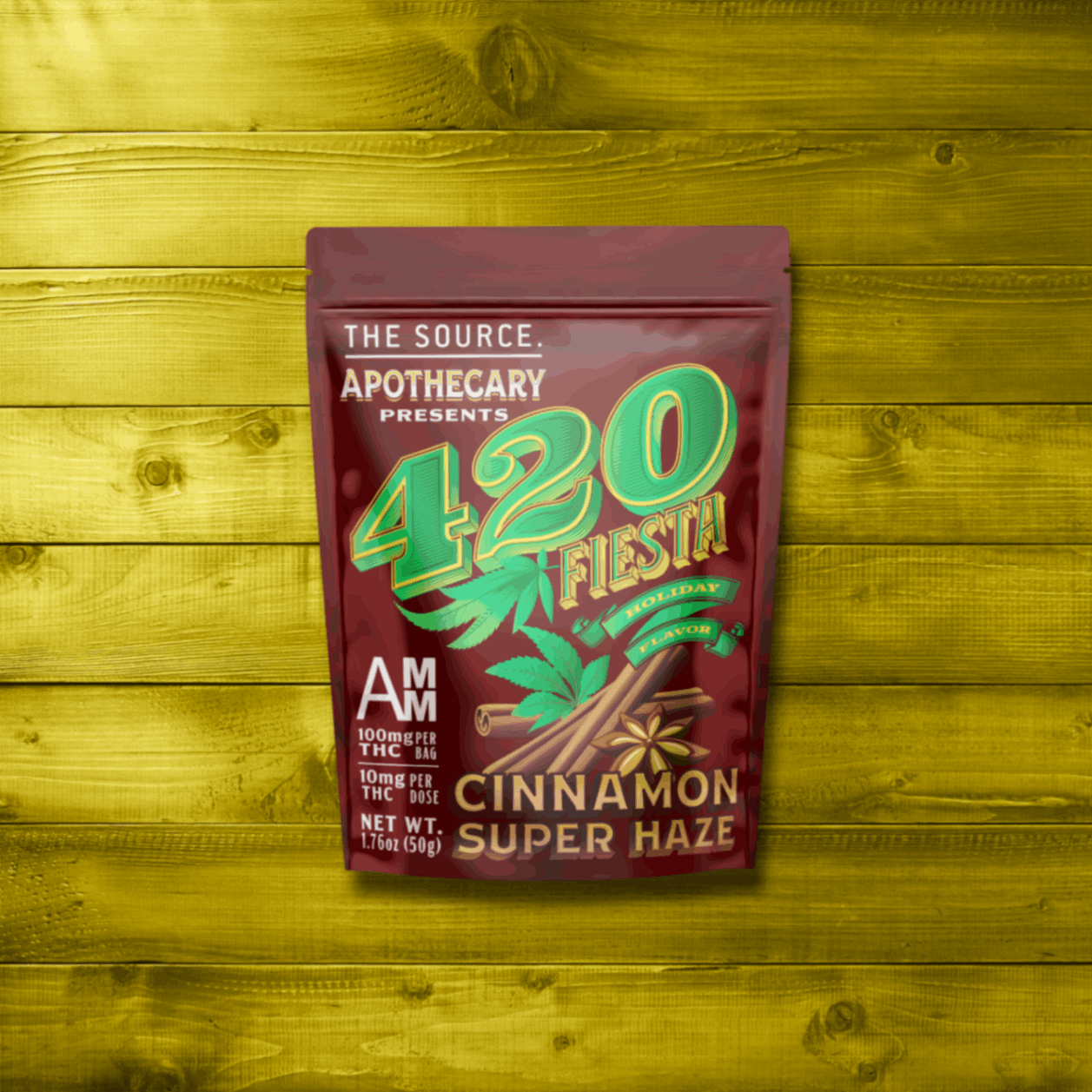 Image depicts The Source Apothecary’s new 420 Fiesta Limited-Edition flavor, Super Cinnamon Haze. The image shows the brown kraft paper packaging on top of a tinted yellow wood background. Inside of the packaging are high quality cannabis infused edibles from The Source Craft Cannabis Company in Rogers, Arkansas.