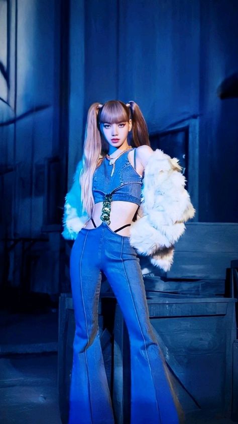 This contains an image of  BLACKPINK Lisa on a blue and white out fit