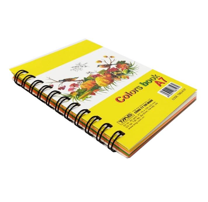 A spiral bound notebook with a yellow cover

AI-generated content may be incorrect.