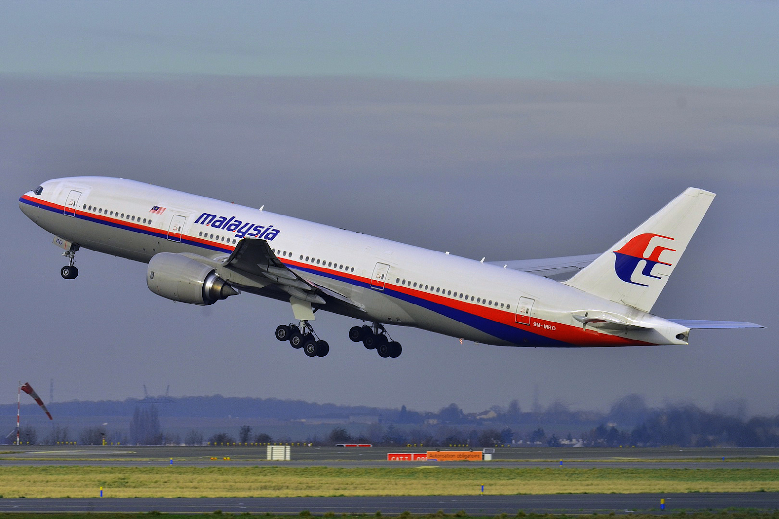  A Malaysia Airlines Boeing 777-200ER taking off.