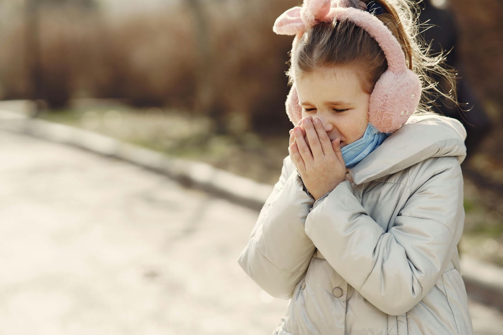 Little Girl Blowing Nose