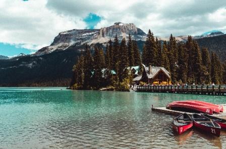 A boat sitting on top of a mountain

Description automatically generated