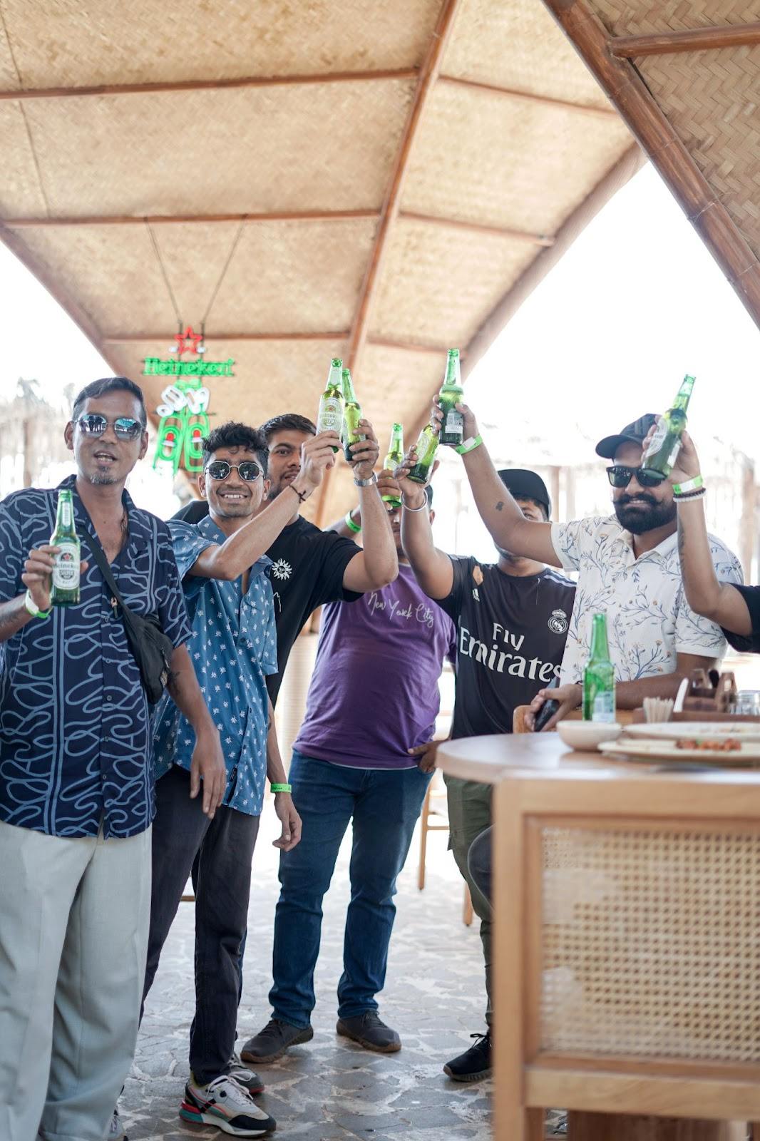 Creative birthday photography showcasing adults raising wine glasses for a fine celebration